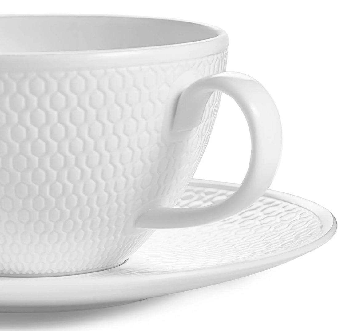 Elevate Your Tea Experience with Timeless Elegance
Complete your all-white tea story with the iconic Wedgwood Gio Teacup and Saucer, now available at a special discounted price.
Crafted from luxurious fine bone china, this set features a subtle geometri
