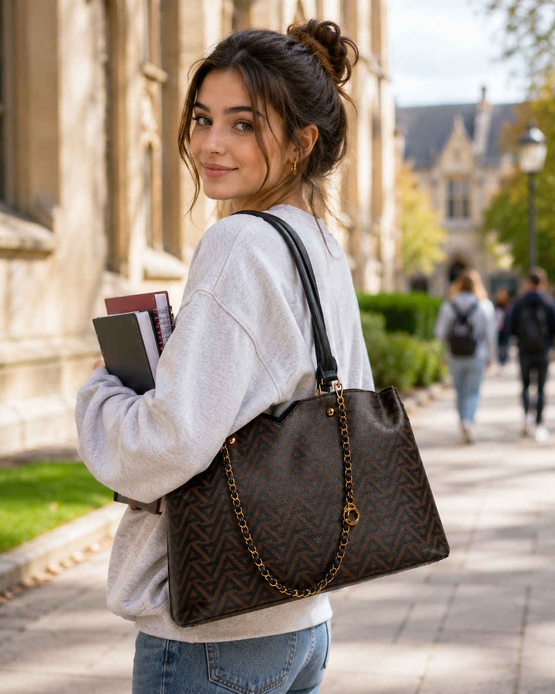 University student carrying the ALDO Viviana brown patterned tote bag on a college campus, ideal for books, daily essentials and everyday use.